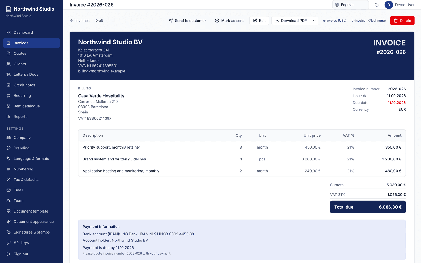 Invoice document with line items, VAT and payment details